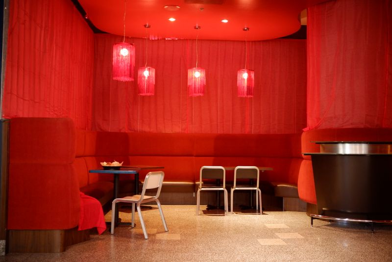 Wings over cozy corner seating interior