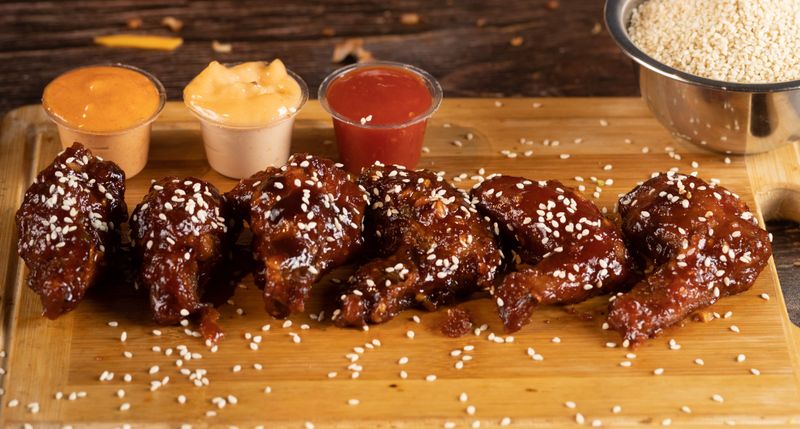 Wings over Garlic Parmesan wings dusted with fresh herbs