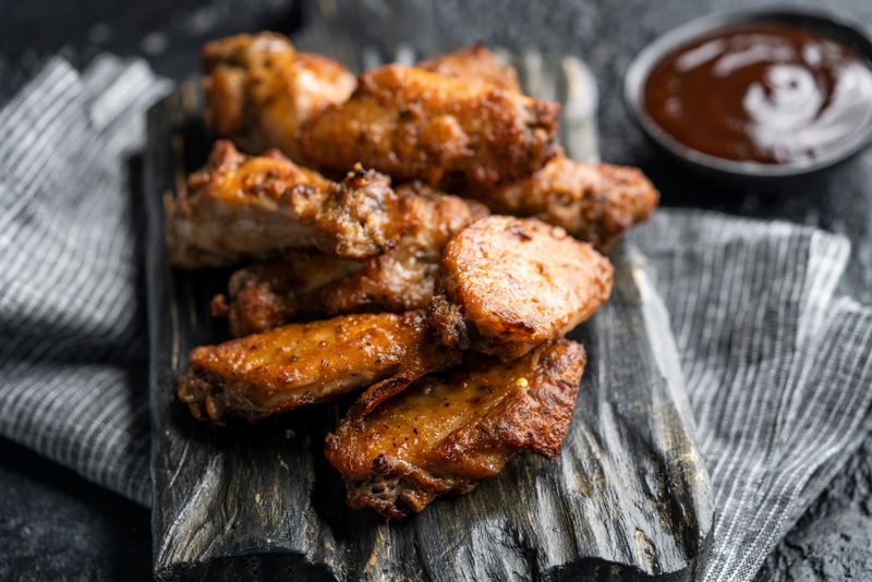 Wings over Teriyaki boneless with sweet soy glaze
