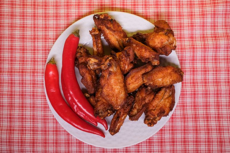 Wings over Lemon Pepper boneless bites with citrus zest
